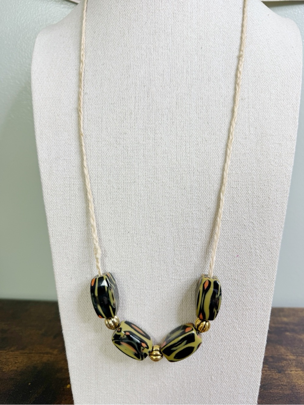 Black & Olive Tribal Pattern Bead Necklace with Gold Accents on Braided Cord